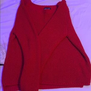A women’s red sweater